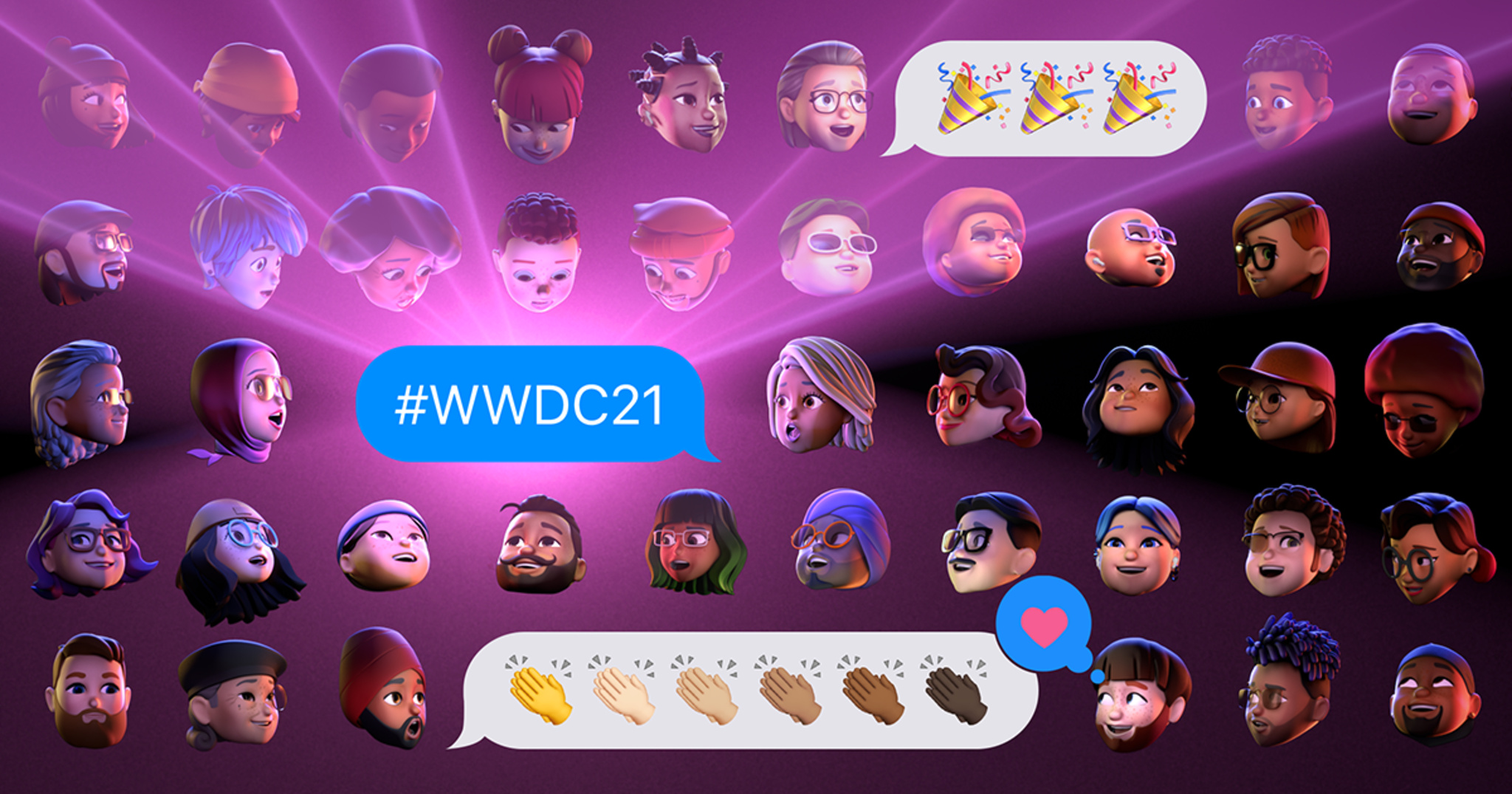 Five rows of unique memojis gaze in amazement at three iMessage texts. A blue text bubble in the center reads “#WWDC21”. A white text bubble above it displays three party popper emojis. A white text bubble below it displays the clapping hands emoji in all six skin tones. This text has been “loved” with a pink heart.