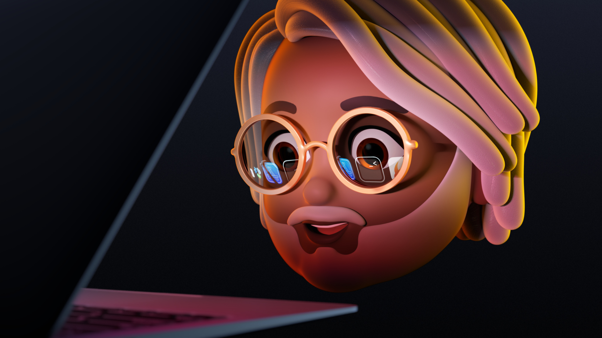 A Memoji staring into an open MacBook Pro