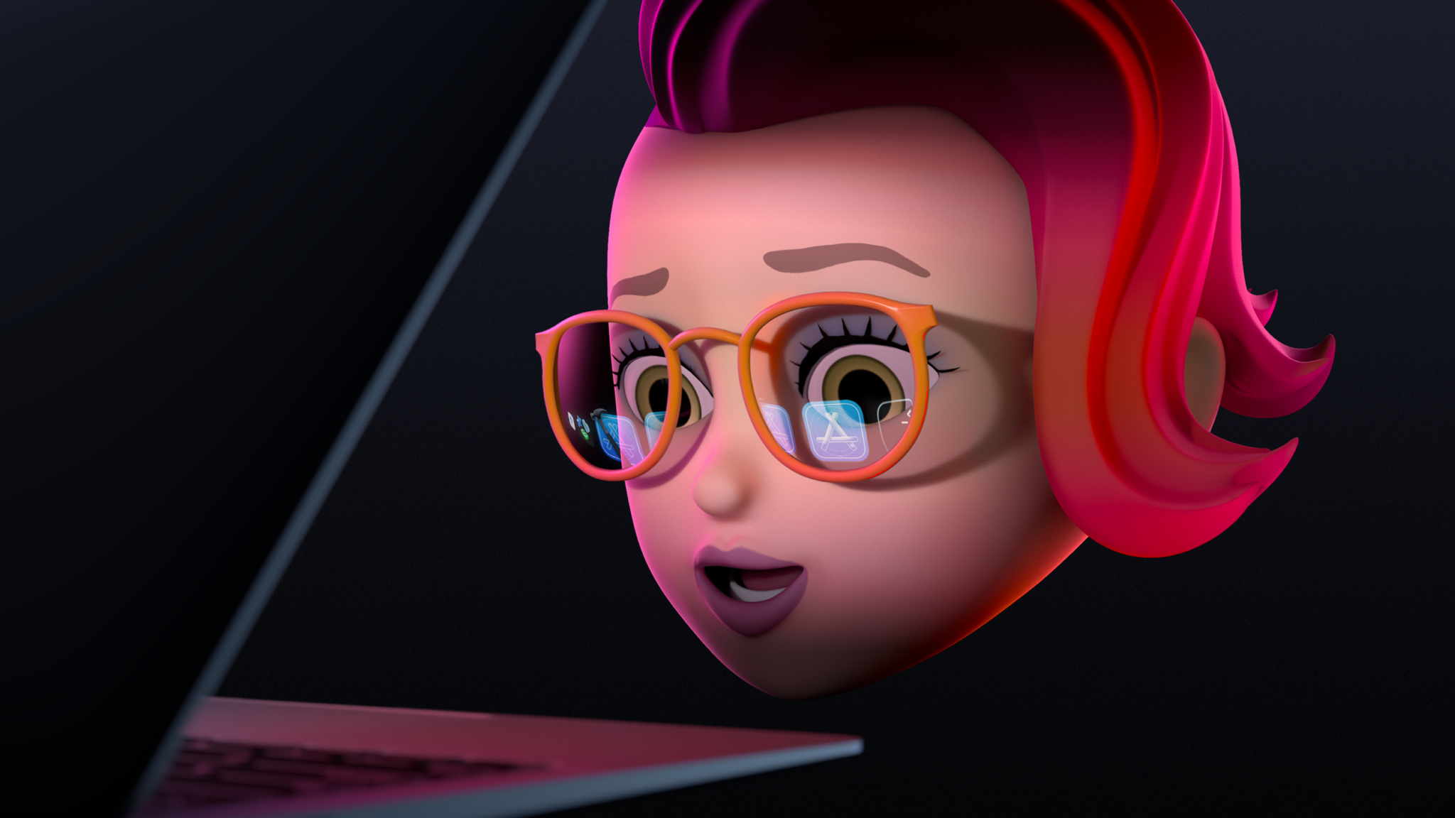 A Memoji staring into the screen of a MacBook Pro. 