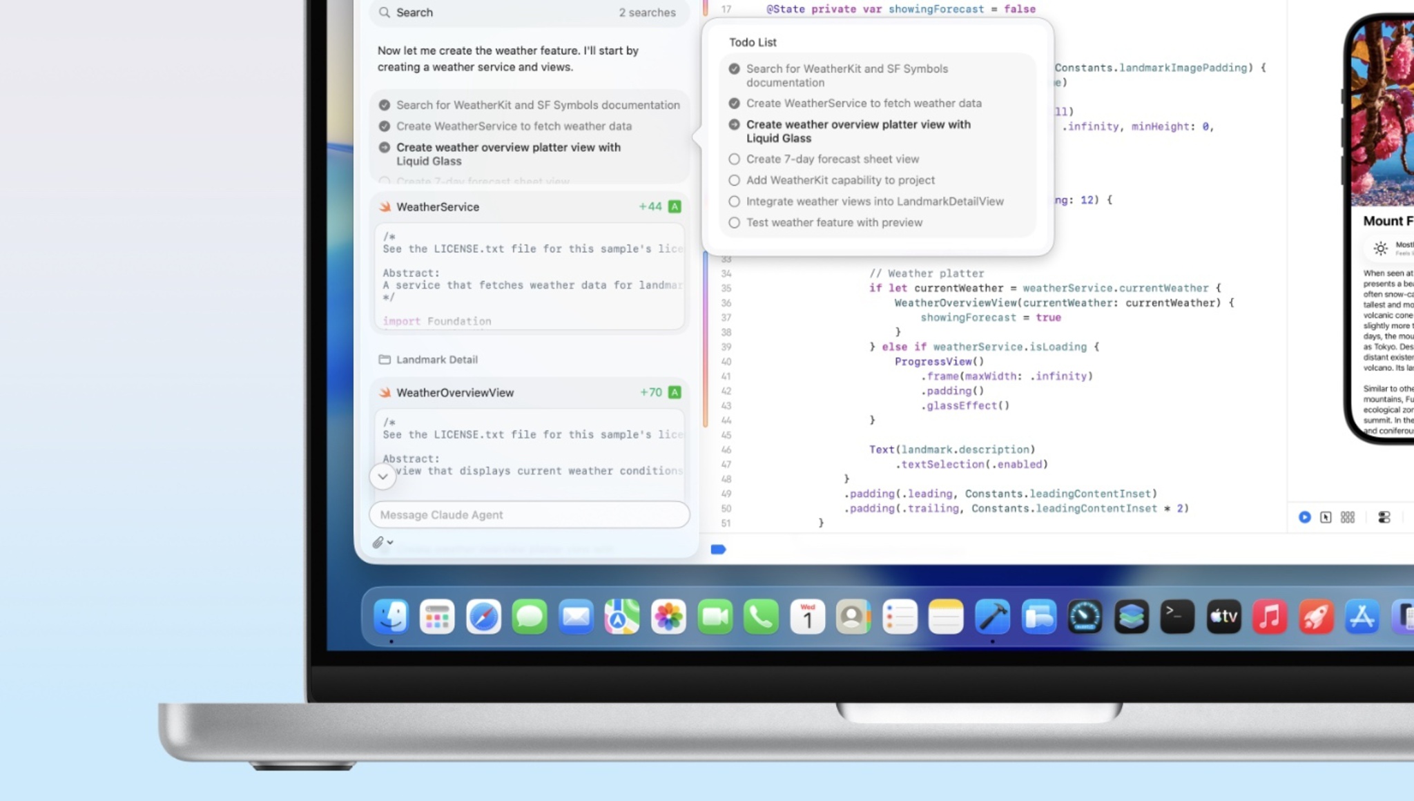 A MacBook with Xcode on the screen.