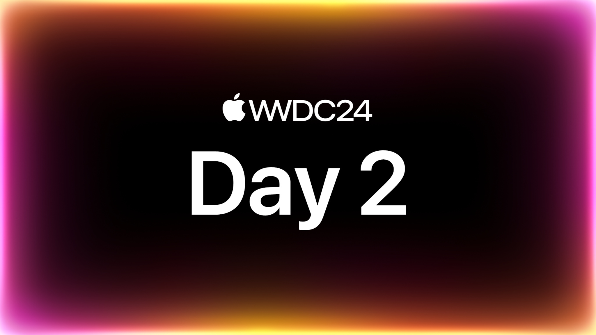 빛나는 주황색, 보라색 테두리가 있는 검은색 배경에 표시된 ‘WWDC24: Day 2’ 텍스트.