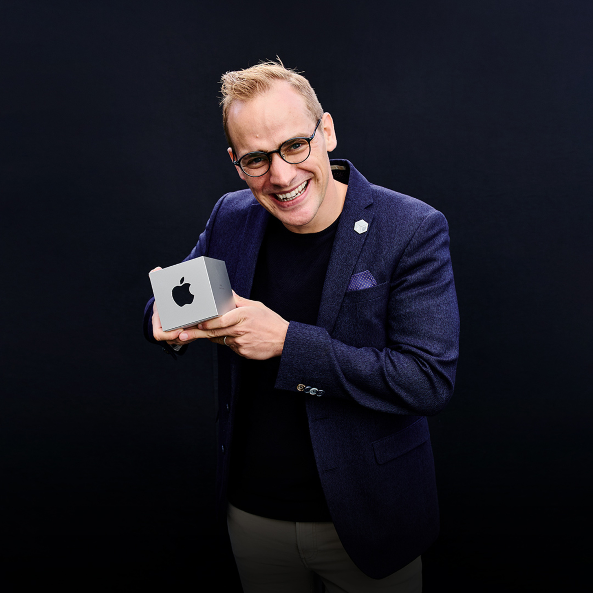 A portrait of Jakob Lykkegaard, founder of Lykke Studios, holding his team’s Apple Design Award.