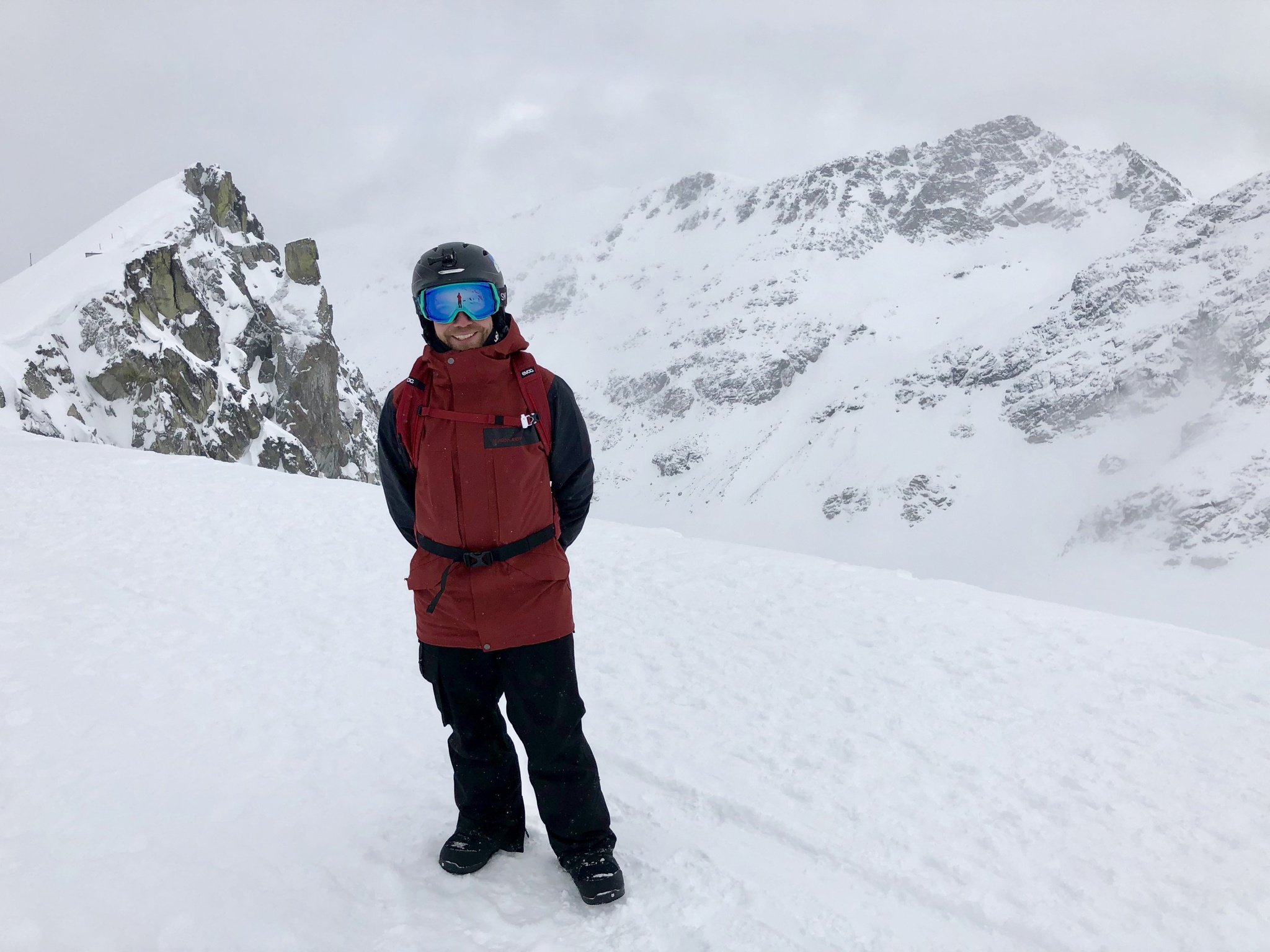 A photo of Herbert in ski gear, standing on a snowy mountain. 