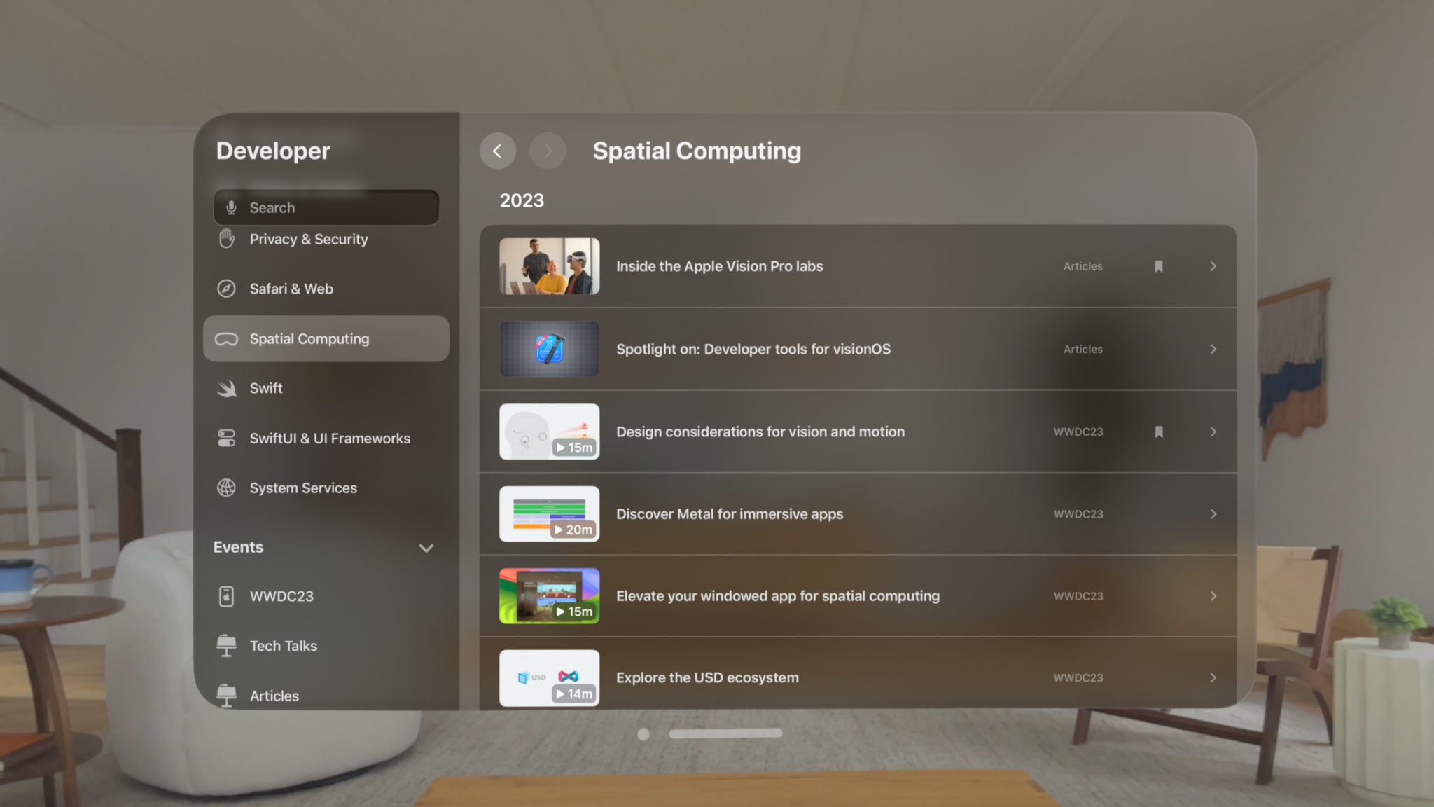 The Apple Developer app on Apple Vision Pro in a living room setting.