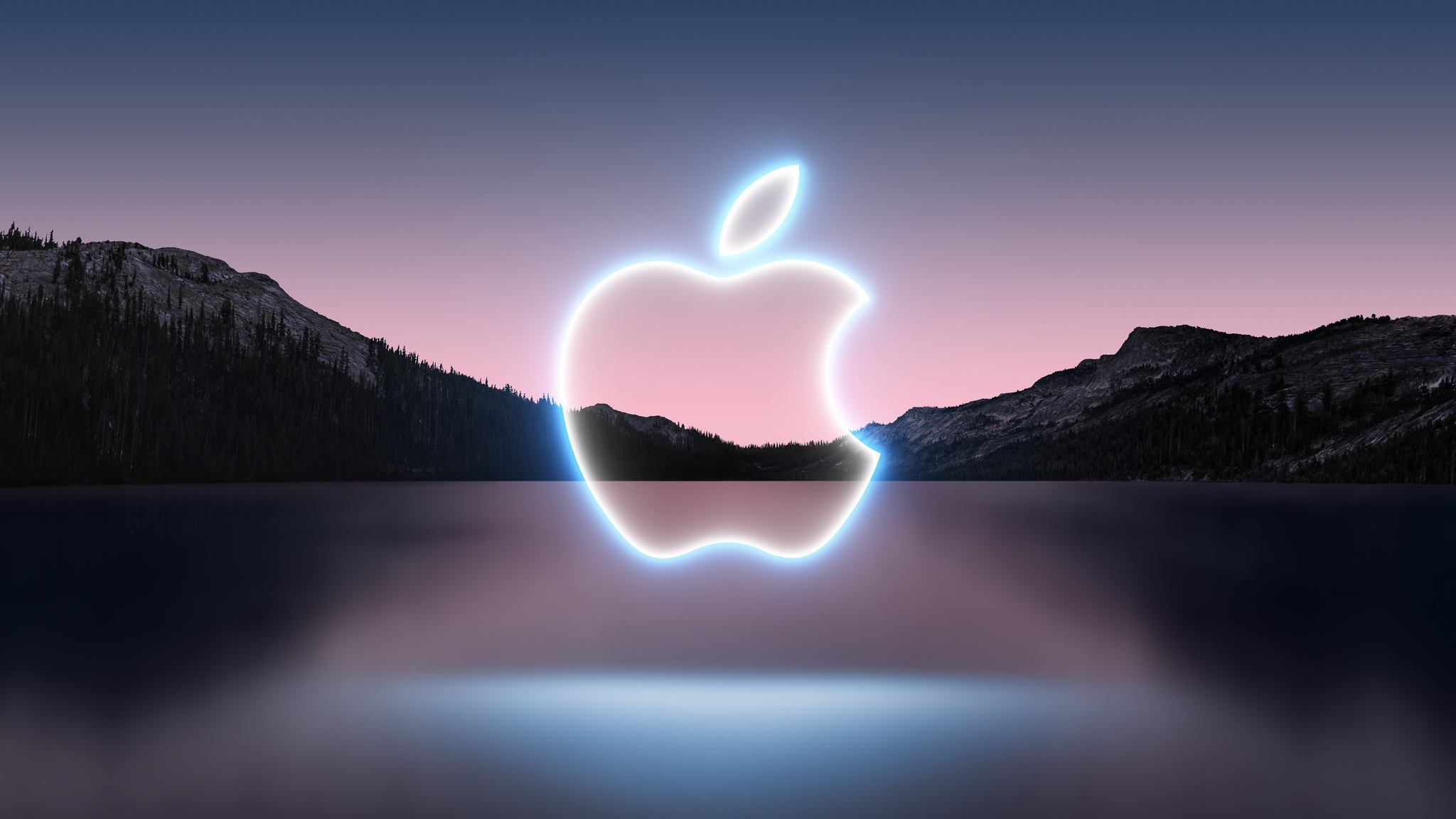 Mountains over lake with apple logo